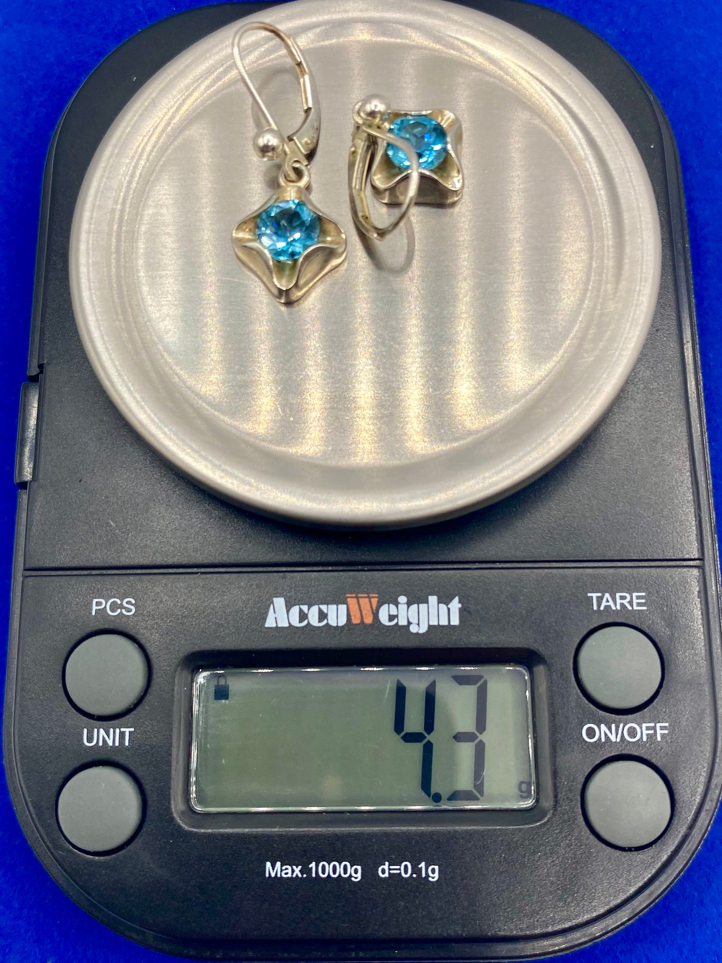 Sterling Silver Blue Topaz Dangle Earrings