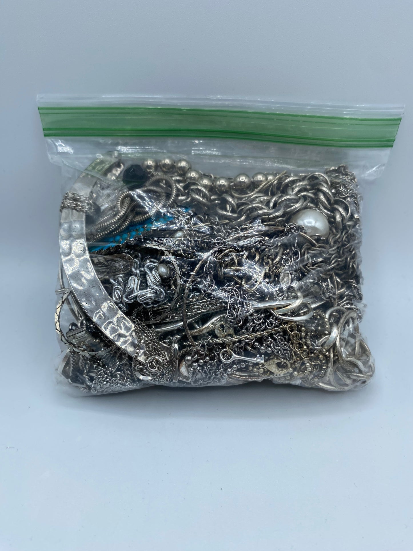 Small Silver Tone Mystery Jewelry Bag #7