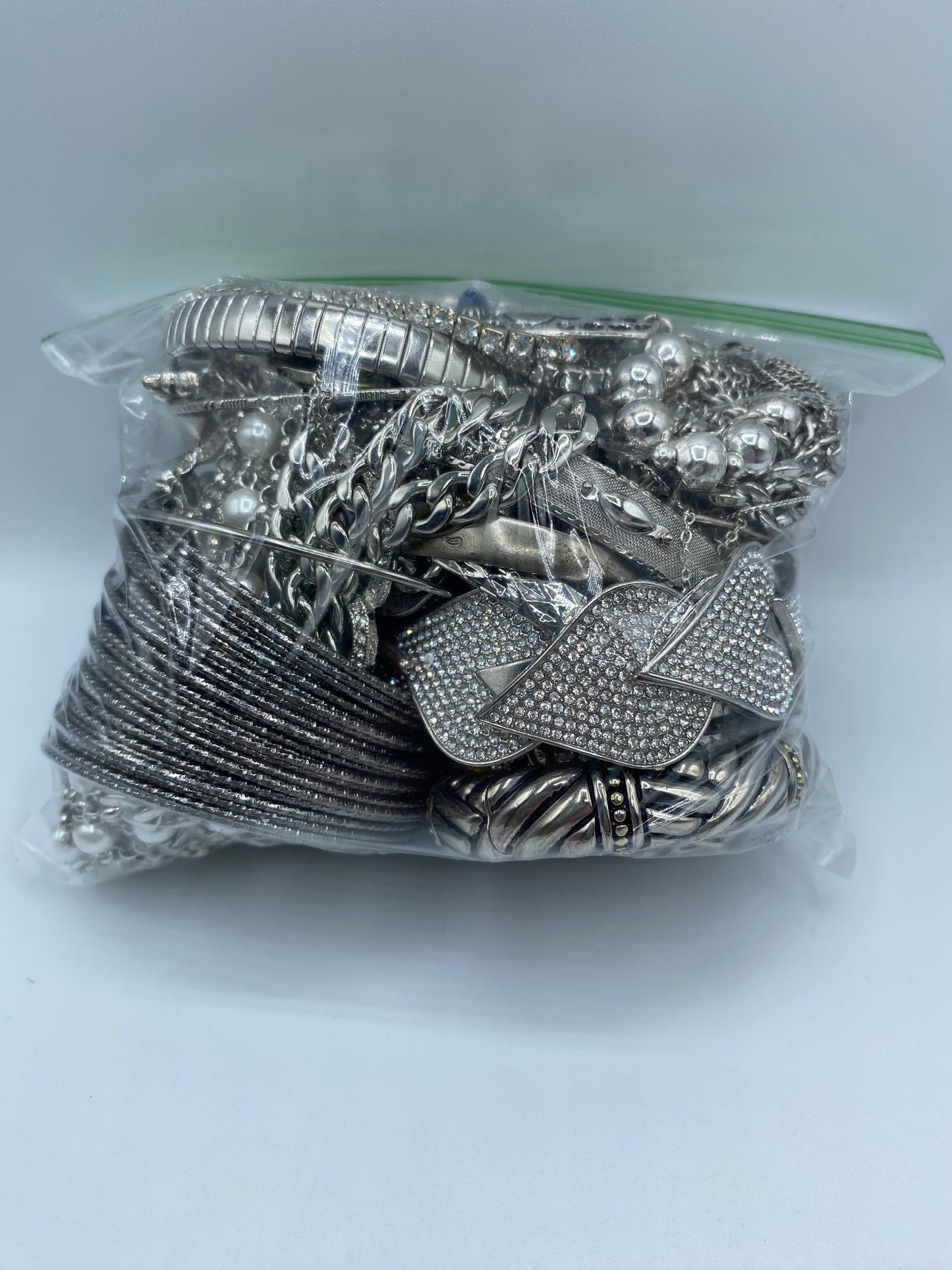 Small Mystery Silver Tone Jewelry Bag #12