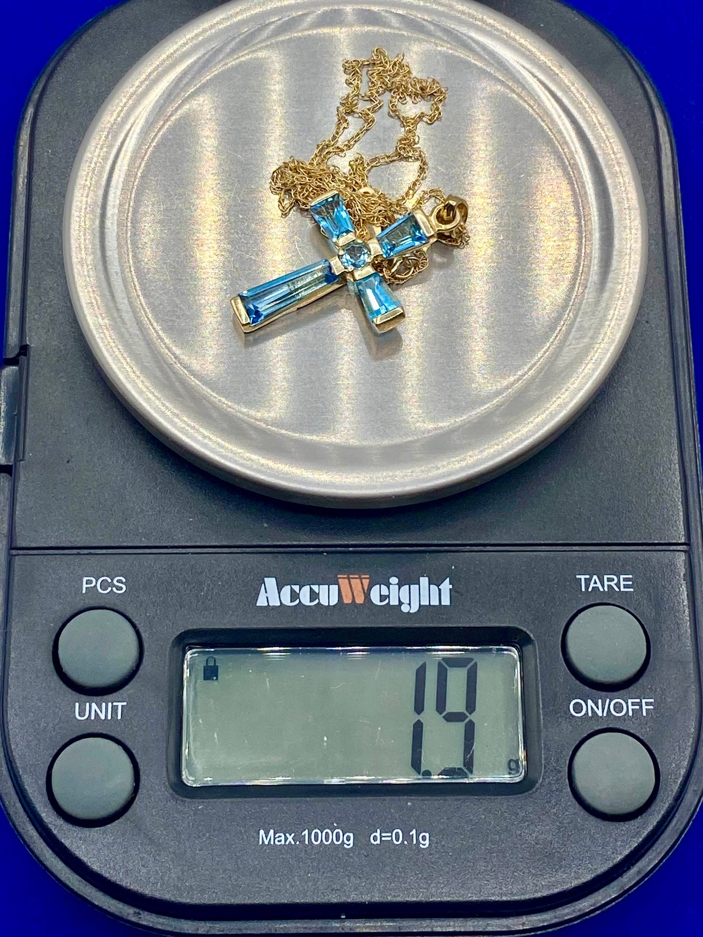 10K Gold Light Blue Topaz Cross Necklace