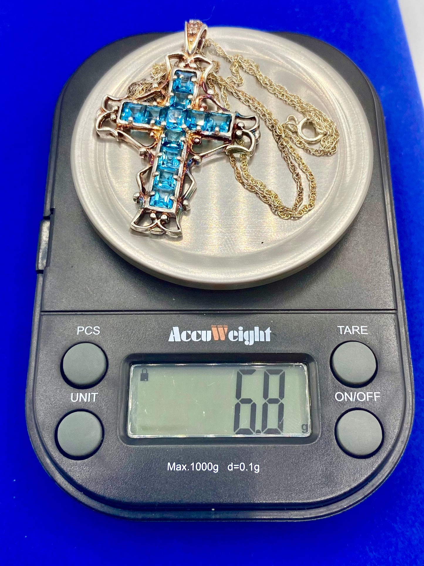 Sterling Silver Light Blue Square Topaz Cross Necklace