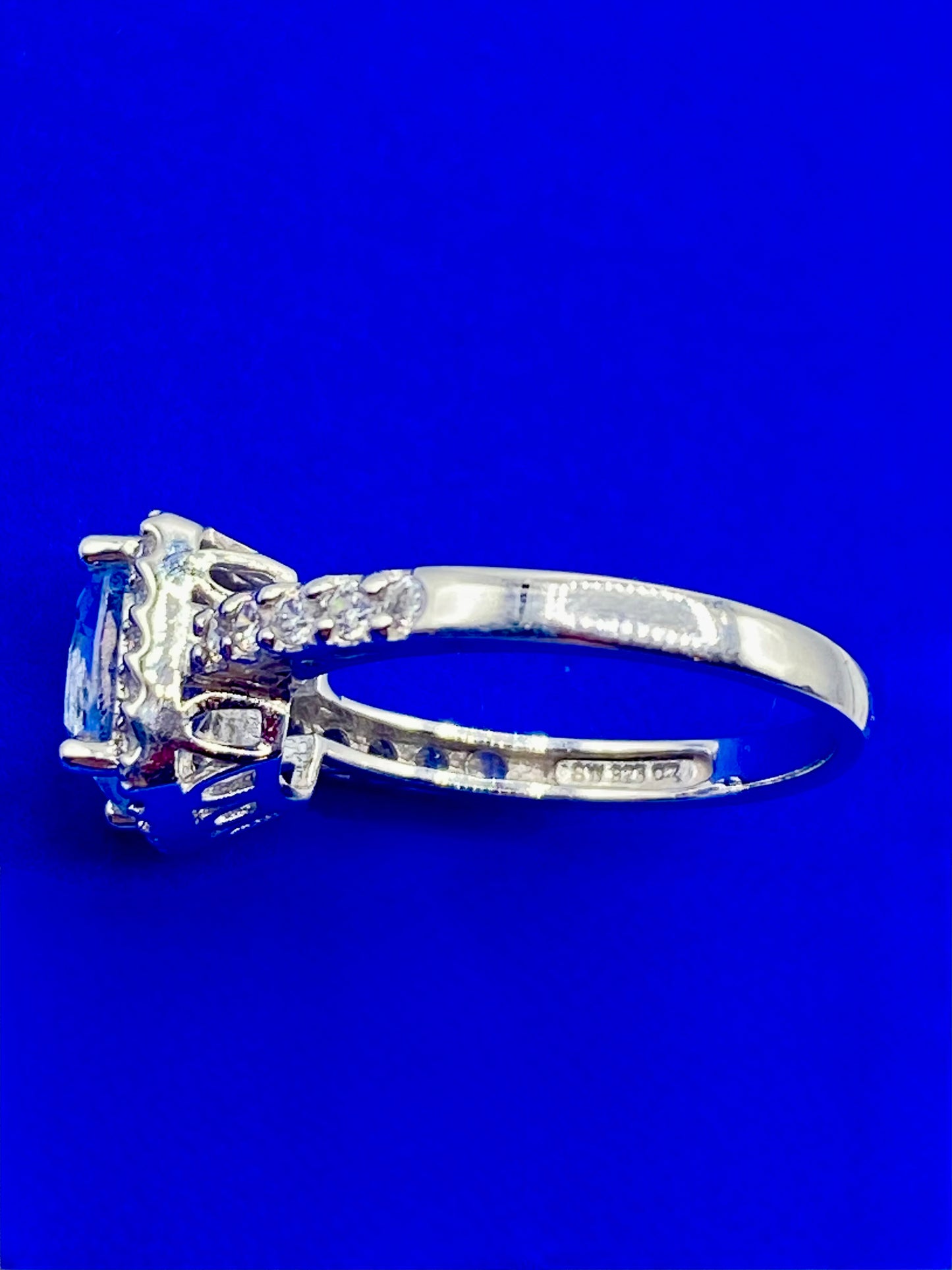 Sterling Silver Light Blue Topaz & CZ Ring