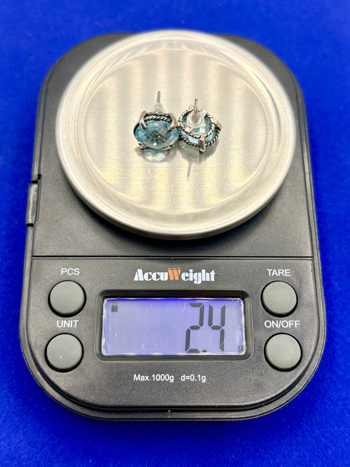 Sterling Silver Light Blue Faceted Topaz Stud Earrings
