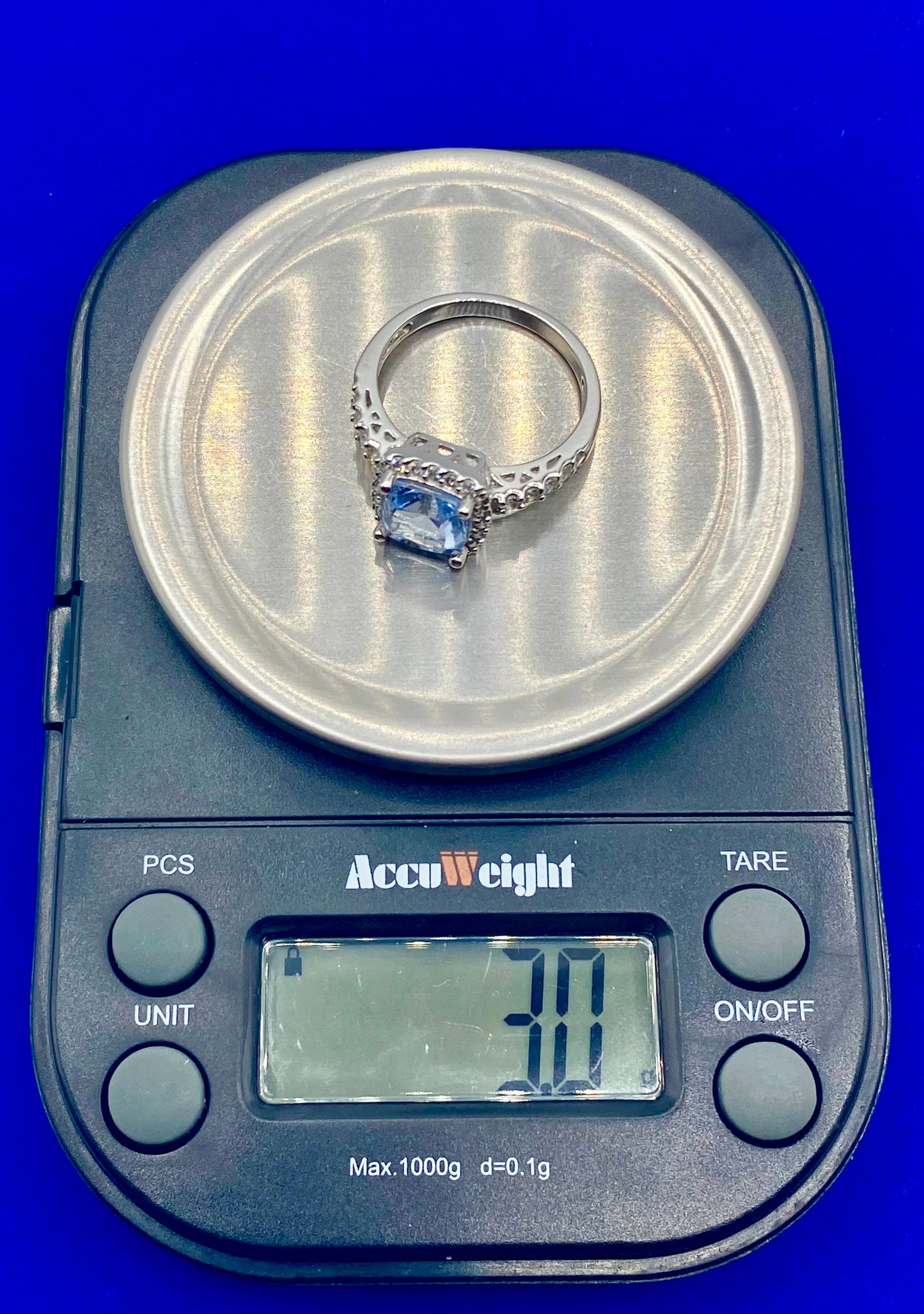 Sterling Silver Light Blue Topaz & CZ Ring