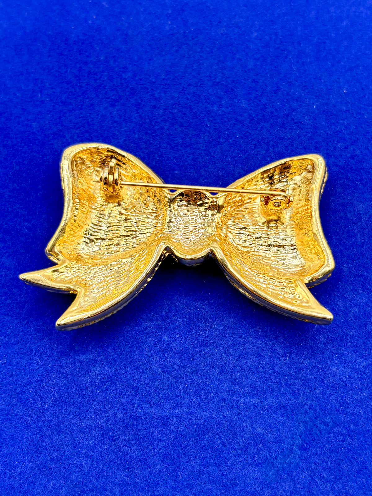 Gold Tone & Red Enameled Bow Tie Brooch