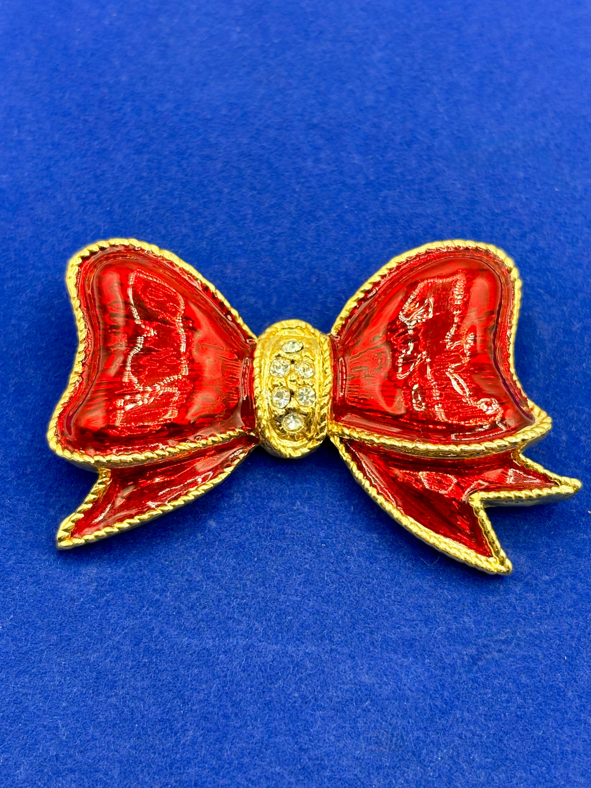 Gold Tone & Red Enameled Bow Tie Brooch