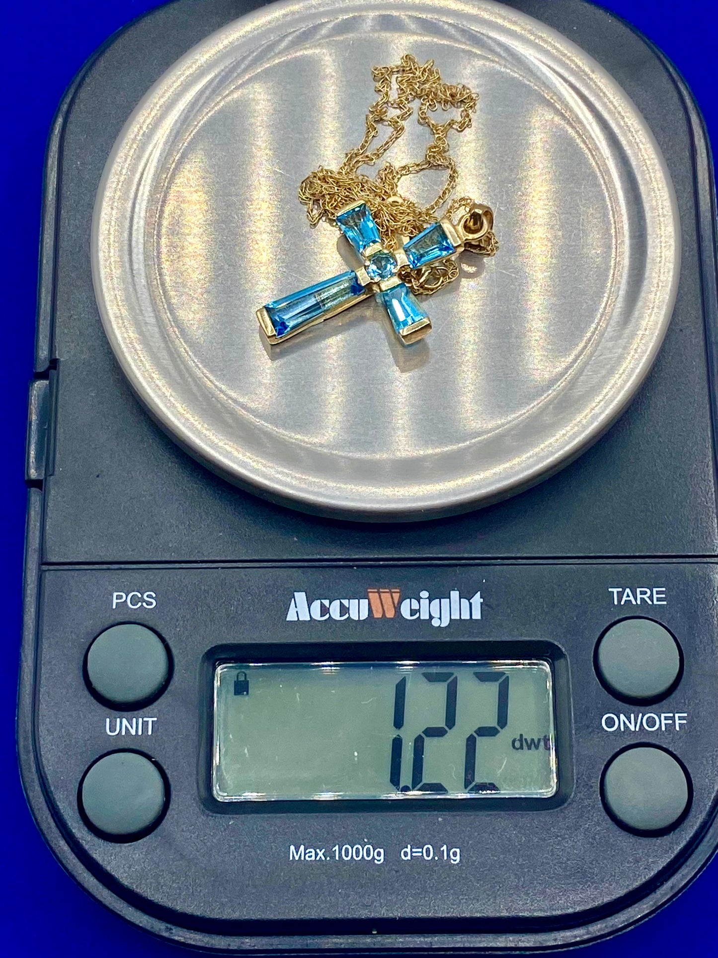 10K Gold Light Blue Topaz Cross Necklace